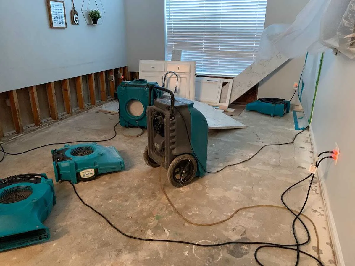 Dehumidifier in flood-cut room for Water Damage Restoration in Bellbrook